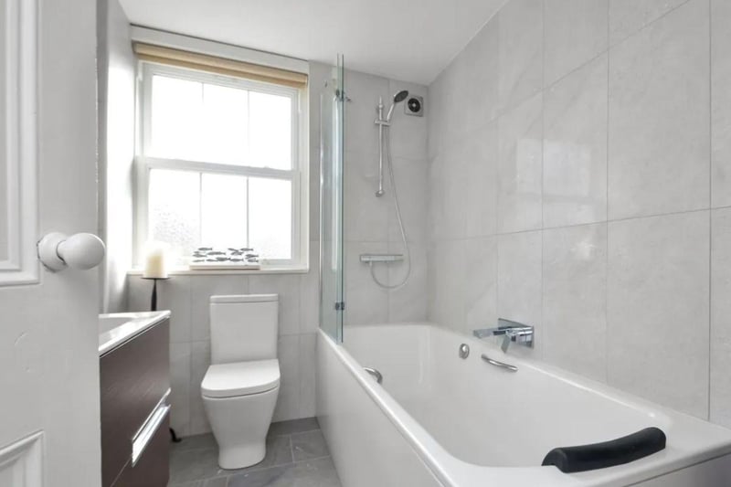 The listng says: "Lympstone House is a symmetrical fronted Victorian Villa which is set back from the road, elevated by an external platform landing reaching by a set of external central steps, this enables large floor to ceiling bay windows to the front aspect, set under a canopy veranda."