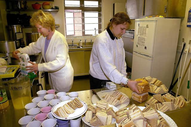 A traditional scene from summers past - the preparing of a cricket tea. Such a scene is unlikely to be seen this summer. Pic: Malcolm Wells.