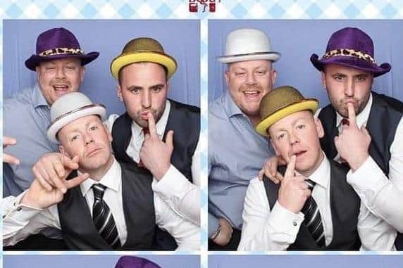 Andy Bromfield, pictured centre, with friend Mike Hart - who set up the fundraiser - right, and another pal.