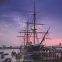 Royal Navy ship HMS Warrior has donned flags in support of England ahead of the Euro 2024 final against Spain. Pictured is the ship at Portsmouth Historic Dockyard. Credit: C Stephens