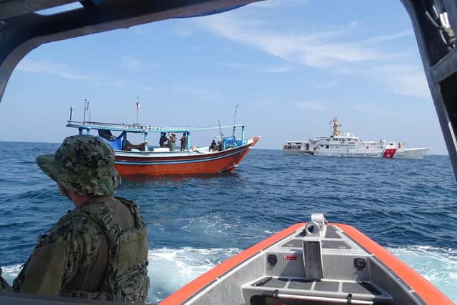 USCG John Scheurman and an intercepted drugs dhow. Picture; Royal Navy
