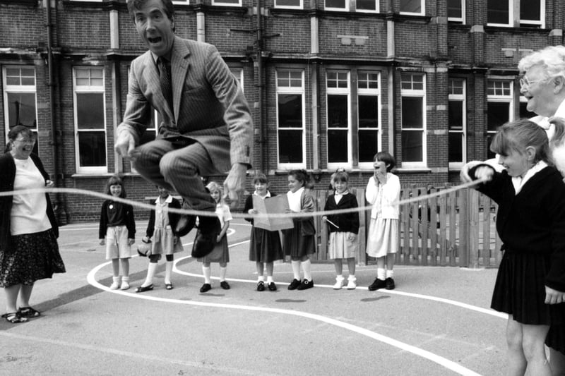 Former MP David Martin joins in playtime with children from Milton Park School. The News PP3773