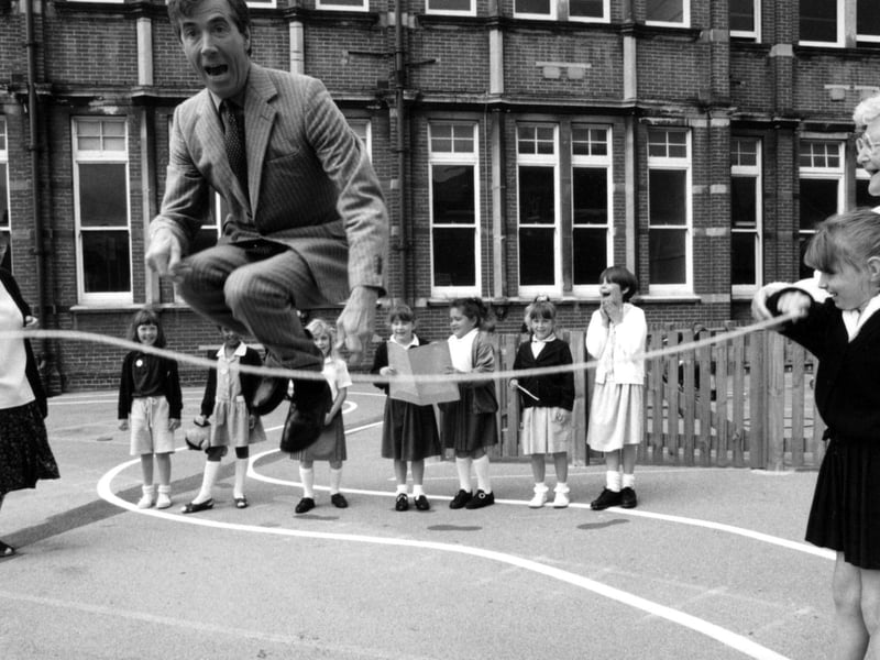 Former MP David Martin joins in playtime with children from Milton Park School. The News PP3773