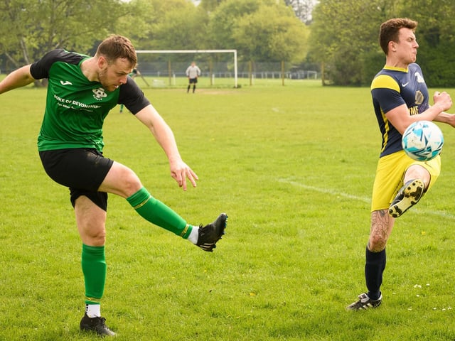 Action from Saturn Royale's 1-0 win over Pelham Arms (blue and yellow kit) in the second Adelaide Cup semi-final. Picture: Keith Woodland (300421-692)