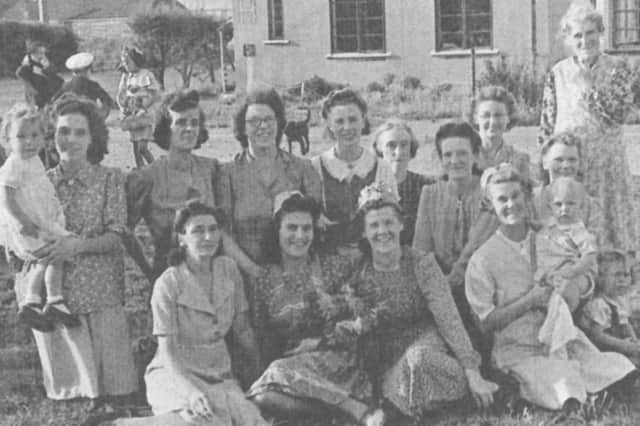 Some of the local women on Tipner Green, Stamshaw, on VE Day, 1945. Picture: John Regnard collection