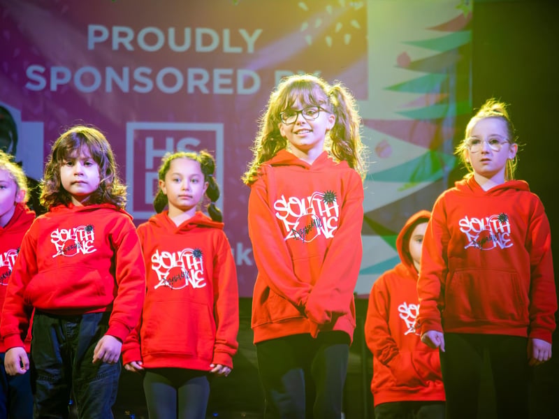 Hundreds of residents descended on Commercial Road to watch local dance troops and celebrities come together to turn on the Christmas lights.
Pictured - South Zone Dancers
Photos by Alex Shute