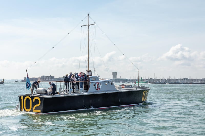 Visitors depart for a tour aboard the RAF High Speed Launch (HSL) 102. Picture: Mike Cooter (08042023)