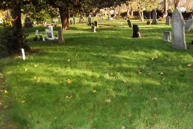 The site of the communal grave, this side of the white post, of six Portsmouth Dockyard men killed when a boiler exploded.  Picture: Bob Hind