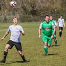 Jake Folland (white) scored for East Lodge in an entertaining 3-3 draw with Cowplain in Division 1 of the Mid-Solent League. Pic: Mike Cooter.