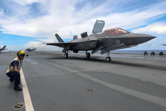 Pictured: One of two newly qualified F35B Lightning Jet pilots takes off from HMS Queen Elizabeth.