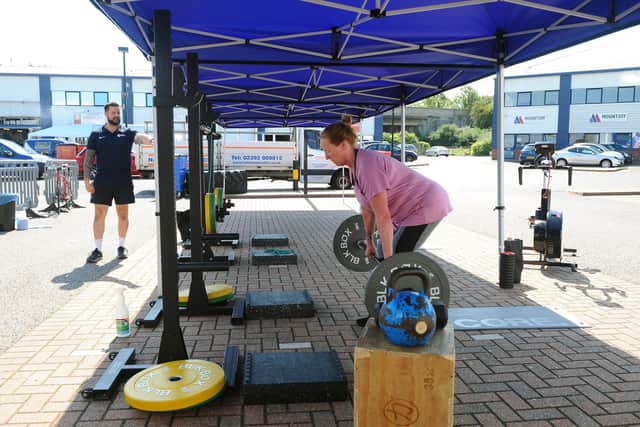 So far, only small outdoor training session can be staged at the gym. Pictured is: Sharon Bedwell from Milton, during her session with fitness coach Chris Phelan.
Picture: Sarah Standing (230620-391)