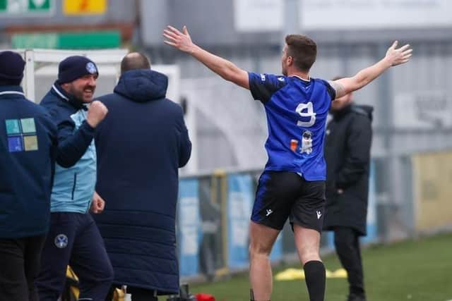 Clanfield boss Lee Blakely, left, celebrates with Fred Penfold after the striker's goal against Colden Common in January - last  night he repeated the feat as the reigning Hampshire Premier League champions were beaten at Westleigh Park