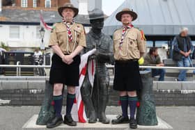 Rover Scouts Chris Arthur (left) and Matthew Trott pose for a photograph in front of a statue of Robert Baden-Powell on Poole Quay in Dorset ahead of its expected removal to "safe storage" following concerns about his actions while in the military and "Nazi sympathies". The action follows a raft of Black Lives Matter protests across the UK, sparked by the death of George Floyd, who was killed on May 25 while in police custody in the US city of Minneapolis. PA Photo. Picture date: Thursday June 11, 2020. See PA story POLICE Floyd. Photo credit should read: Andrew Matthews/PA Wire 