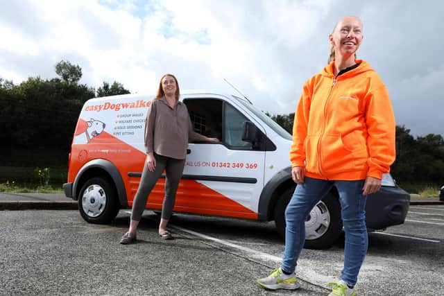 Suzi Neale, right, is the new franchisee for easyDogwalker in the Havant area, pictured here with Lucy Platt, director, at Hilsea LidoPicture: Chris Moorhouse   (jpns 280921-05)