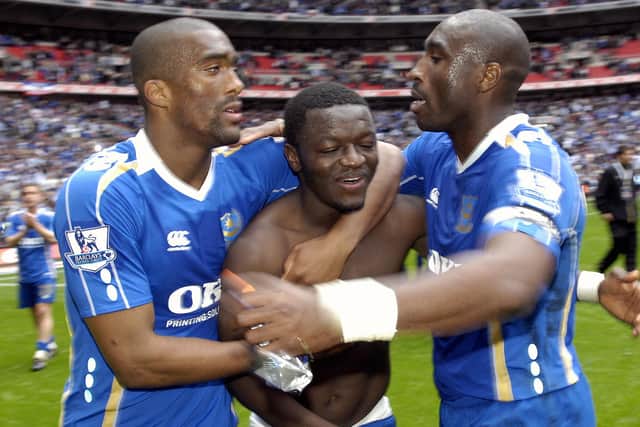 Sylvain Distin with Sulley Muntari,centre, and Sol Campbell, right, celebrate Pompey's FA Cup 2008 semi-final win over West Brom. Picture: Will Caddy