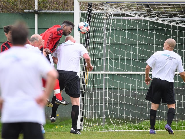 Action from the Jon Gittens memorial charity match between a team of former Fareham Town players and a side of ex-Pompey and Southampton professionals. Picture: Keith Woodland (160421-603)