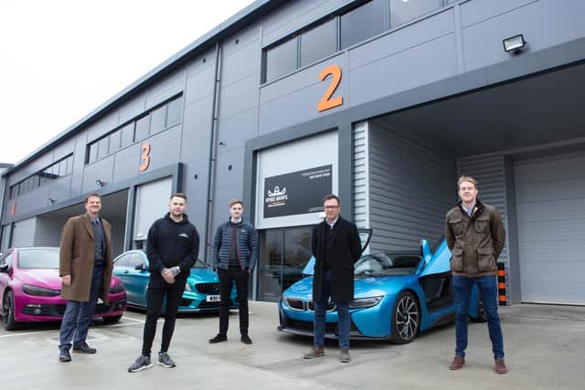 Car wrapping specialist Amigo Wraps is the first company to move into one of 10 units at brand-new Concorde Park, Segensworth. From left, Russell Mogridge of Vail Williams, Amigo Wraps owner Alan Gonzalez, Ollie Sherriff of CBRE, Mark Hooper, development director at Kingsbridge Estates, and Alex Gauntlett of Vail Williams.