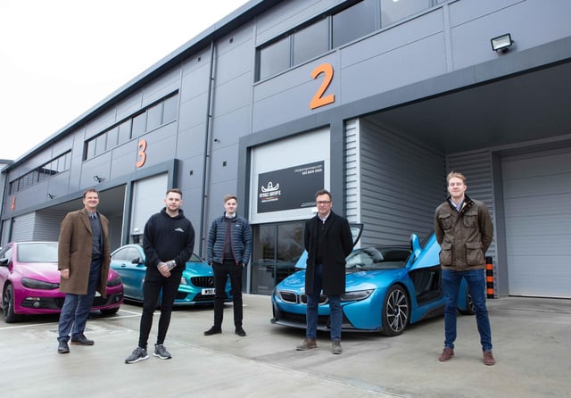 Auto wrapping specialist Amigo Wraps is the first to move to one of 10 units in the brand new Concorde Park in Segensworth.  From left Russell Mogridge of Vail Williams, Alan Gonzalez, owner of Amigo Wraps, Ollie Sherriff of CBRE, Mark Hooper, development director at Kingsbridge Estates, and Alex Gauntlett of Vail Williams.