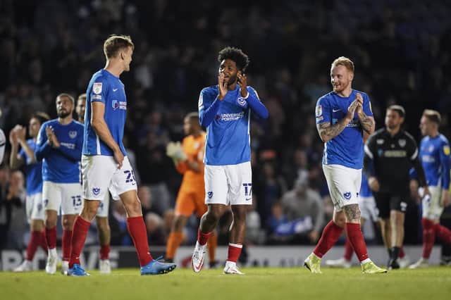 Sean Raggett, Ellis Harrison and Connor Ogilvie applaud the fans after Tuesday night's 1-0 win over Shrewsbury. Picture: Jason Brown/ProSportsImages