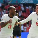 Mason Mount rushes to congratulate Raheem Sterling following his match-winner against Croatia on Sunday.  Picture: GLYN KIRK/POOL/AFP via Getty Images)