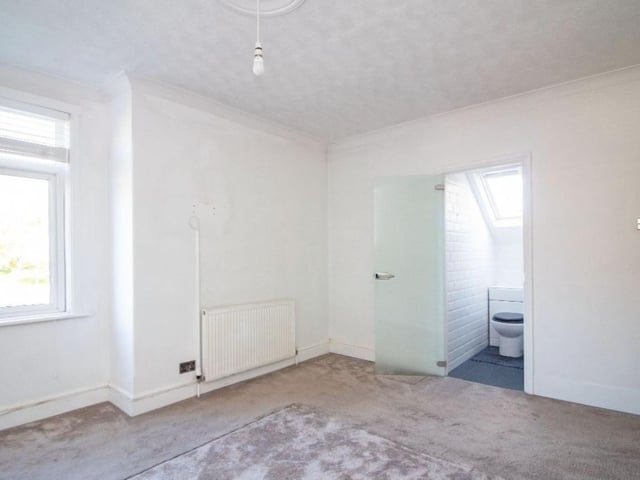 The listing says: "Accommodation boasting lounge with separate dining room and log burning stove, kitchen / breakfast room, ground floor bathroom, ensuite to master bedroom, driveway and southerly aspect rear garden."
