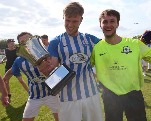 Coach & Horses Albion keeper Adam Puckett, right, after his three shoot-out saves helped his side win the Challenge Cup. Picture: Chris Moorhouse