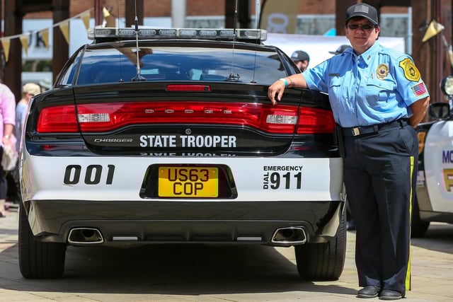 Sharon Evans with an American police car at Fareham 999 Day, West Street, Fareham.Picture: Chris Moorhouse (220624-18)