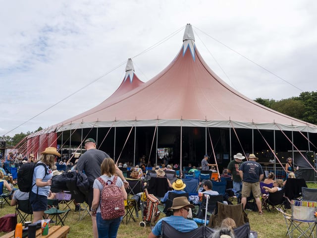 Crowds spill out of one the stages awaiting the next act.