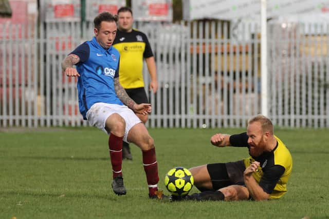 Action from Purbrook (yellow) v Port South in the Victory Cup. Picture by Kevin Shipp.