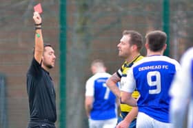 Craig Hardy is shown Paulsgrove's first red card of the afternoon against Denmead. Picture by Martyn White