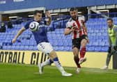 There's nothing wrong for scouring League Two for talent - Enda Stevens (right) was once a performer there for Pompey. Picture: Andrew Yates/Sportimage