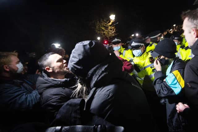 People clash with police as they gather in Clapham Common, London, after the Reclaim These Streets vigil for Sarah Everard was officially cancelled Picture: Victoria Jones/PA Wire