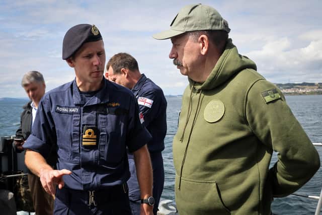 Ukraine's deputy defence minister Volodymyr Havrylov (right) as he visits a Royal Navy Sandown-class minehunter at sea off the coat of Scotland, to witness first-hand the training being provided to Ukrainian sailors.