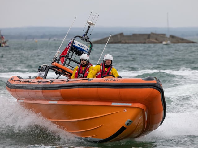 RNLI crews demonstrate their craft's manoeuvrability during the open day at Langstone Harbour. Picture: Mike Cooter (310824)
