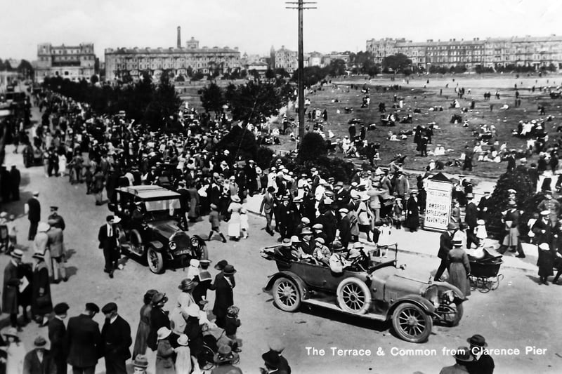 Looking across Southsea Common from Clarence Pier. Fantastic crowds walking along Pier Road  in the 1920's.