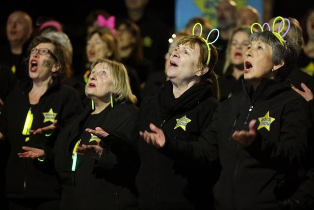 Rock Choir singing at Glow Walk Southsea on March 18, 2022