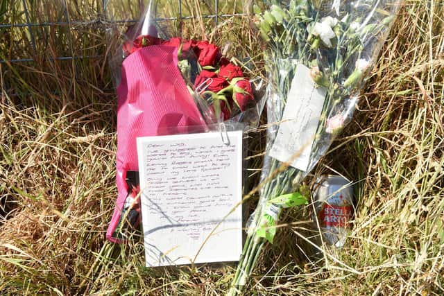 Tributes left in Fareham Park Recreation Ground just off Hilson Drive in Fareham, where a man died after allegedly being attacked by a dog.

Picture: Sarah Standing (120822-1682)
