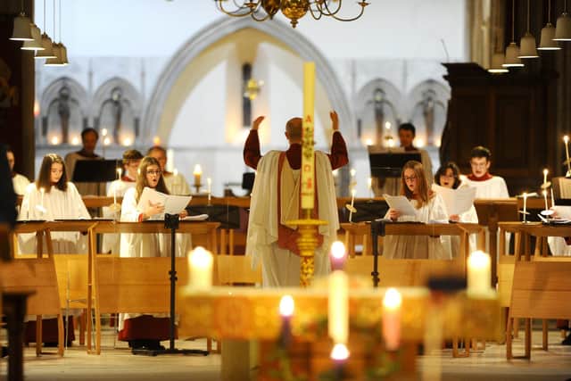 The choir singing Christmas carols during the Pompey Heroes service at Portsmouth Cathedral.
Picture: Sarah Standing (211220-9838)