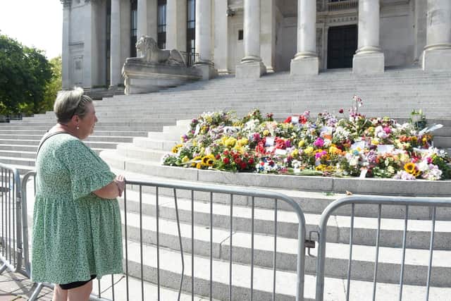 Floral tributes on the Portsmouth Guildhall steps in Guildhall Square, Portsmouth, on Monday, September 12. Picture: Sarah Standing (120922-3281)