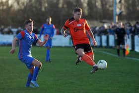 Portchester's Jake Raine, right, during the January 2023 'El Creekio' derby which attracted an all-time record Wessex League attendance to the On-Site Group Stadium. Picture: Sarah Standing