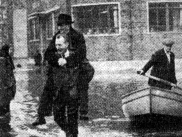 Flooding on Broad Street, Old Portsmouth. A Portsmouth Evening News photograph saved by W. G. Barrett of flooding in Old Portsmouth.