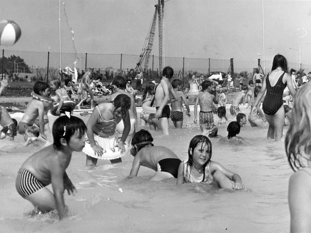 Looks like fun! Children enjoying the splash pool in August 1973