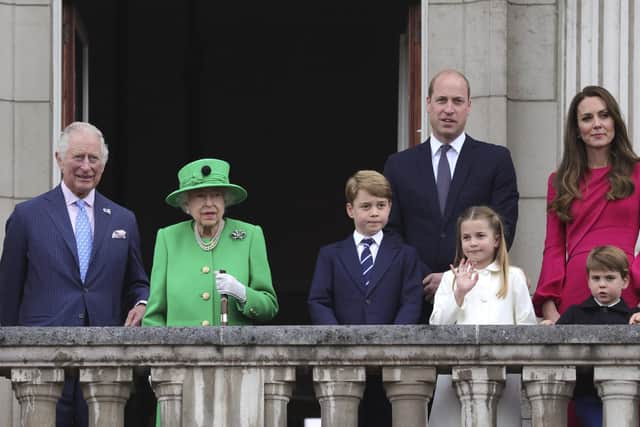 From left, Prince Charles, Queen Elizabeth II, Prince George, Prince William, Princess Charlotte, Prince Louis and Kate, Duchess of Cambridge stand on the balcony, at the end of the Platinum Jubilee Pageant held outside Buckingham Palace today
Picture: Chris Jackson/Pool Photo via AP