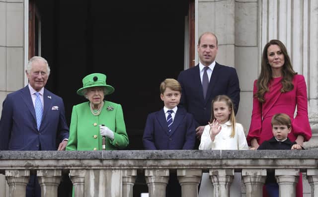 From left, Prince Charles, Queen Elizabeth II, Prince George, Prince William, Princess Charlotte, Prince Louis and Kate, Duchess of Cambridge stand on the balcony, at the end of the Platinum Jubilee Pageant held outside Buckingham Palace today 
Picture: Chris Jackson/Pool Photo via AP
