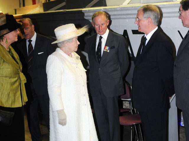 The Queen visits Portsmouth, pictured at the D-Day Museum chatting to Stephen Brooks who was a curator at the museum.