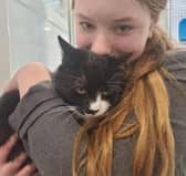 Millie the cat has been reunited with her Clanfield family after six years. Pic Supplied