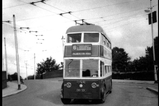 Copnor Bridge with a trolley bus No.306 on a No.6 service. Taken on 17 August 1962 by Allan Milton who supplied the photo the bus is running south. behind are the trees surrounding the bowling green. 306 was one of fifteen supplied during 1950/51 to the Corporation Transport Department.