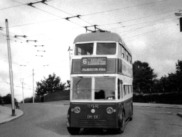 Copnor Bridge with a trolley bus No.306 on a No.6 service. Taken on 17 August 1962 by Allan Milton who supplied the photo the bus is running south. behind are the trees surrounding the bowling green. 306 was one of fifteen supplied during 1950/51 to the Corporation Transport Department.