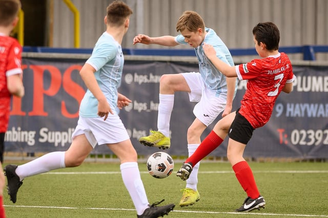 Action from the Portsmouth Youth League Geldard Invitation Cup final between Jubilee 77 U13s and Castle United U13s (light blue and white kit). Picture: Keith Woodland (190321-380)