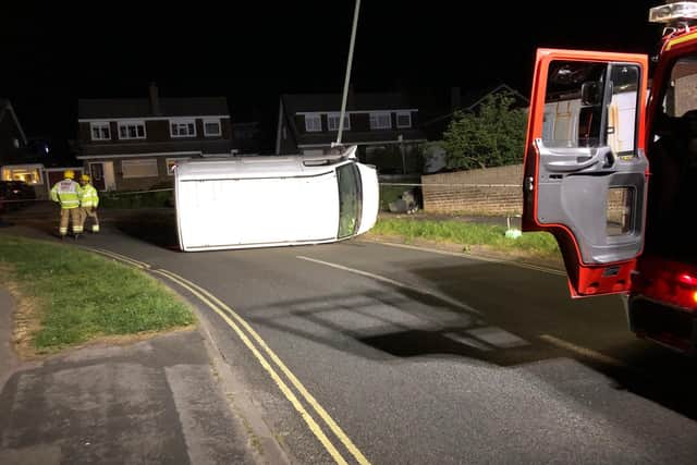 The van turned on its side after a crash in Dore Avenue last night. Picture: Portchester Fire Station via Twitter